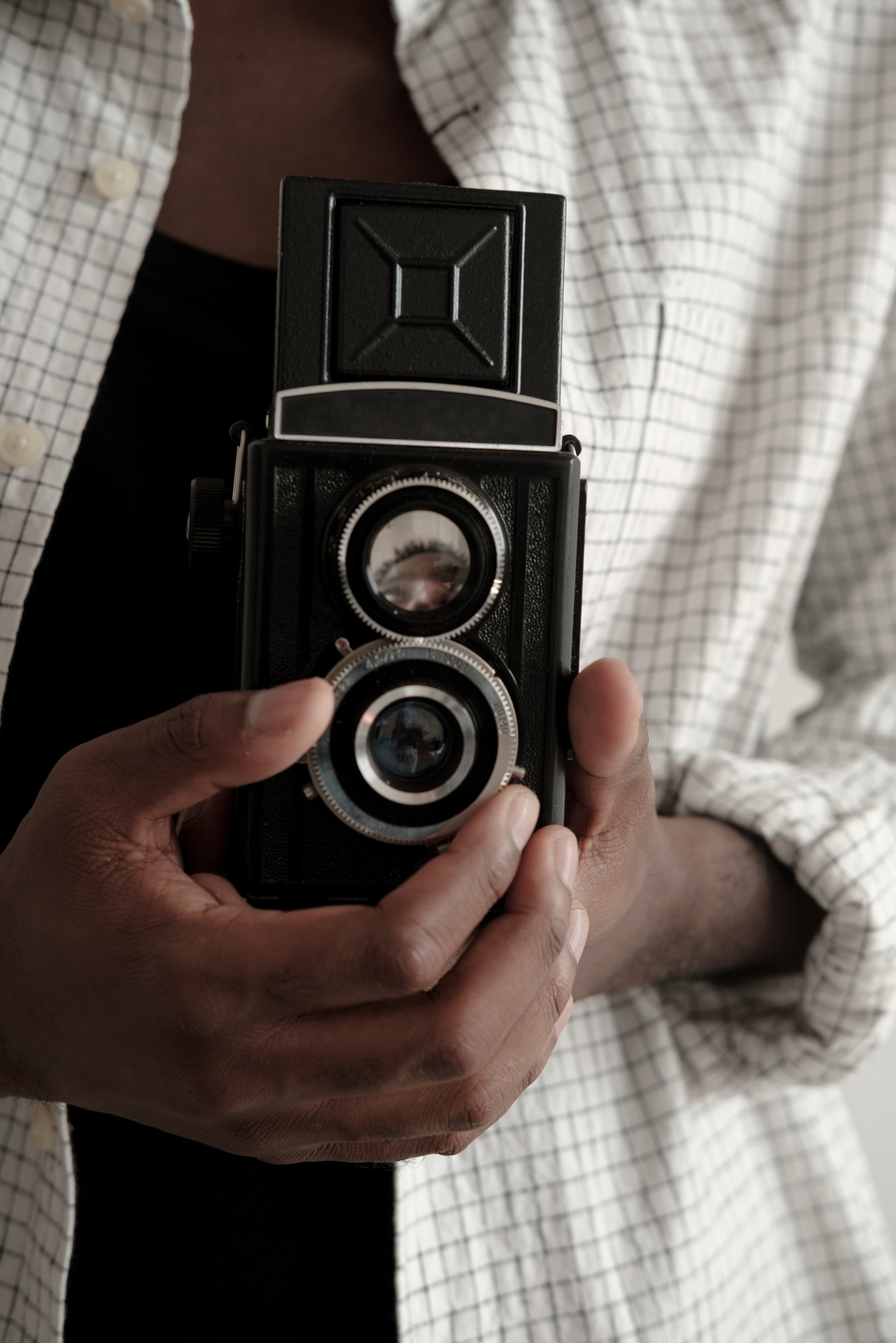 Man Taking a Photo with Retro Camera